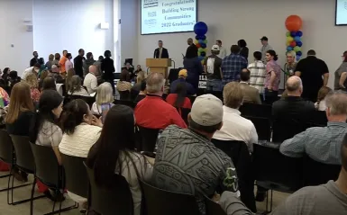 a photo of the Building Strong Communities Graduation in the Grand Hall