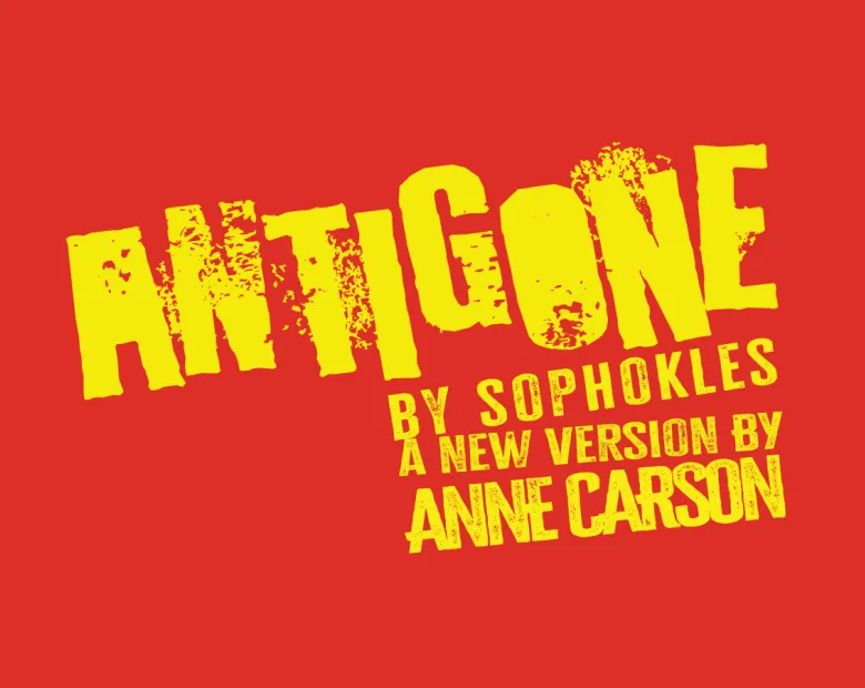 An title card with the name of the play "Antigone."