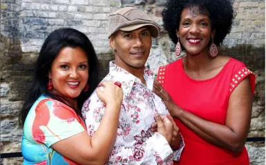 An image of three members of the salsa band, Salsa del Soul.