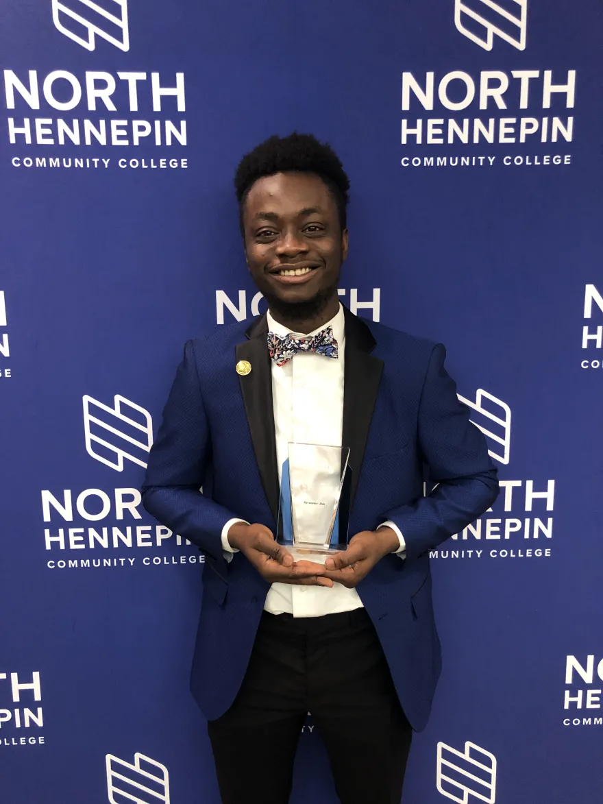 NHCC student, Sylvester Jah with his award