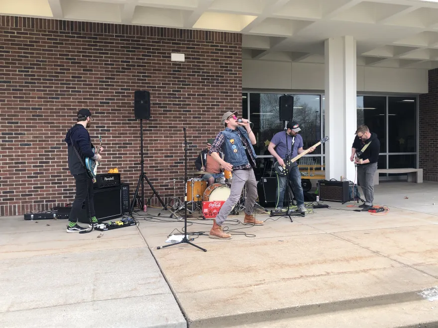 Brandon H's band outside of the Campus Center