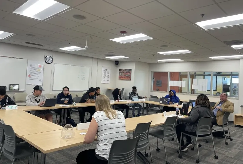 a photo of a student senate meeting in the upstairs of the Campus Center