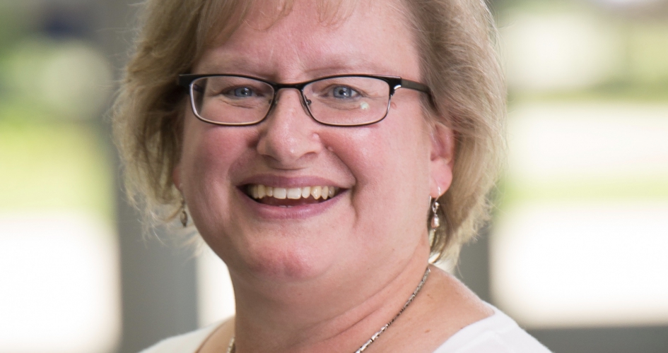 Paralegal Program Director & Instructor, Mary Fenske standing outside smiling at the camera
