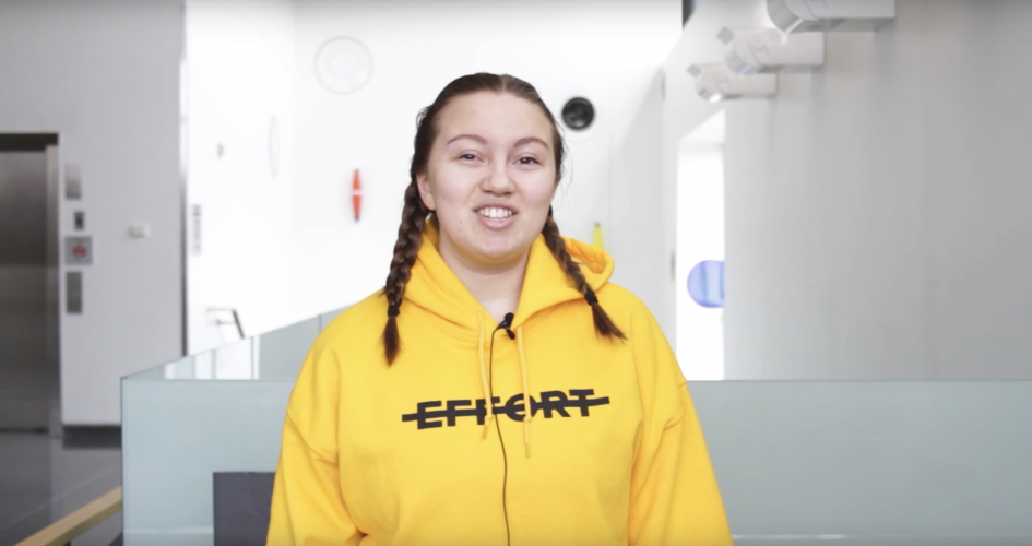 female student inside talking