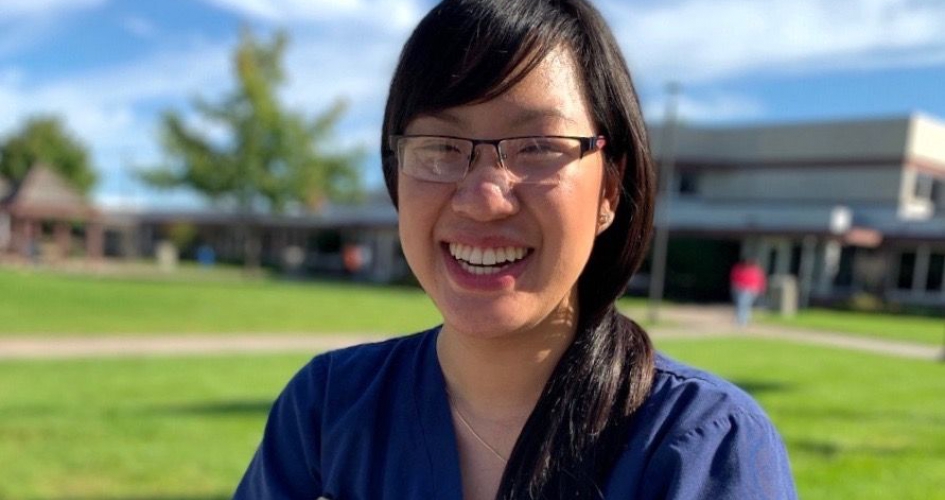 student Jessica Nguyen standing outside smiling