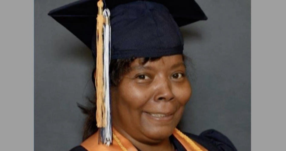 alumni Deb Fortney posing for her graduation phot