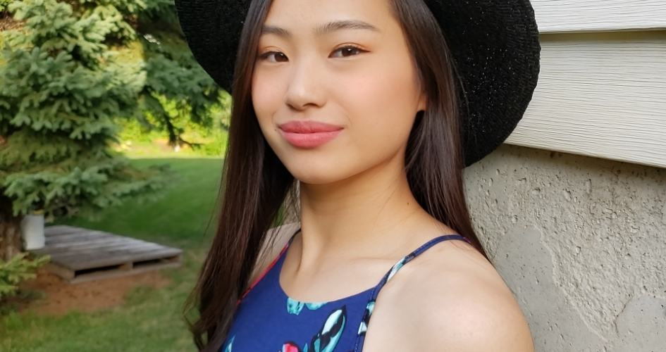 STEM Student Christina Yang standing outside smiling at the camera