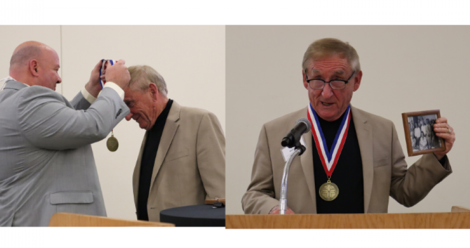 Photo of Dr. Garcia presenting the 2021 Medallion award
