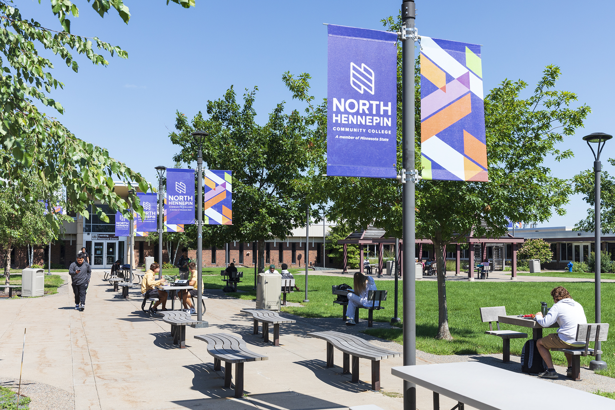 students on campus on a sunny day