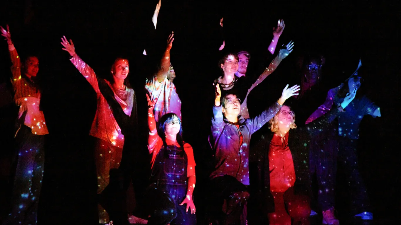 Actors on stage in a musical theater production