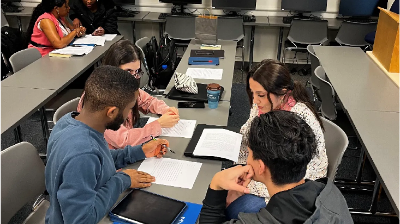 students working together at a table 