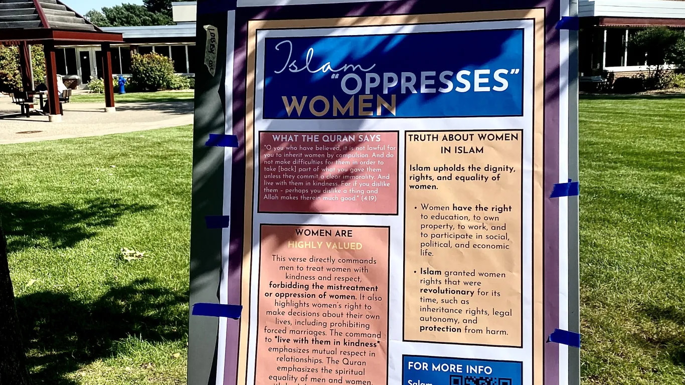 a poster on a stand outside