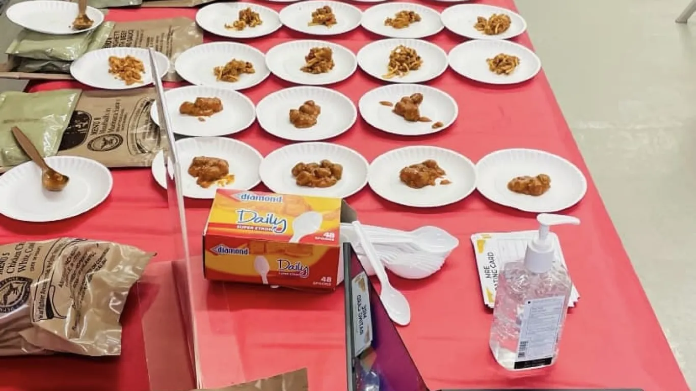 a photo of food samples on little paper plates in the Campus Center for students to try.