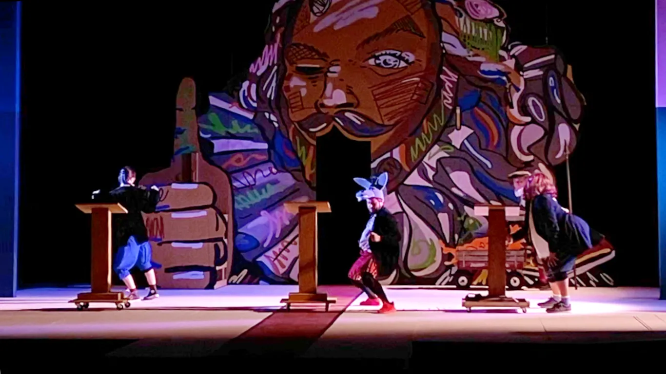 Actors performing on stage in the play “The Complete Works of William Shakespeare (abridged) [revised] [again]”