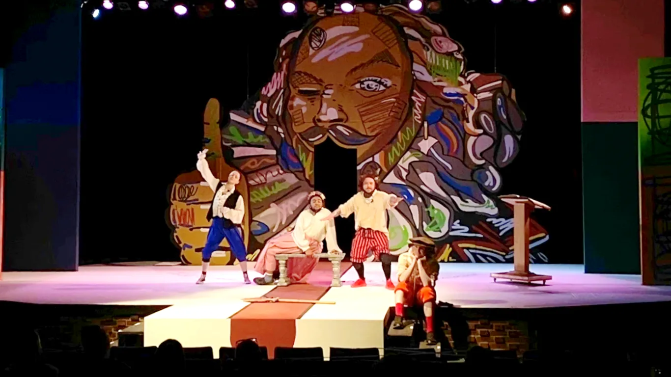 Actors performing on stage in the play “The Complete Works of William Shakespeare (abridged) [revised] [again]”