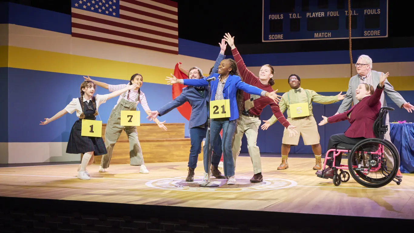 Actors on stage performing in the musical “The 25th Annual Putnam County Spelling Bee”