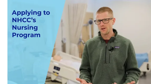 man with glasses talking in the nursing lab