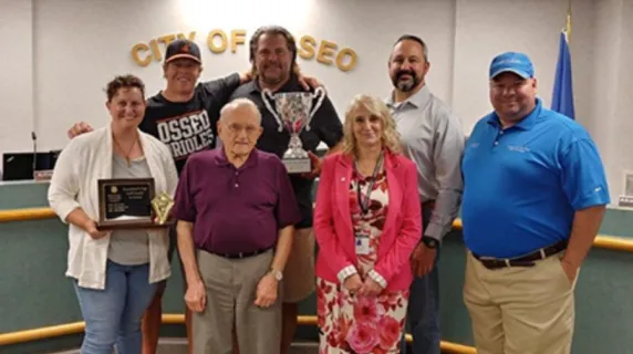 group of golfers smiling