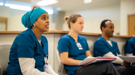 nursing students sitting and looking attentive 