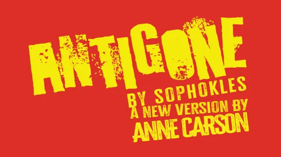An title card with the name of the play "Antigone."