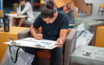 Student working in class
