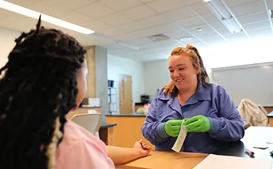 Phlebotomy students in the lab 