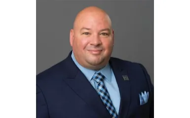 man in a nice suit smiling