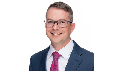 man in a nice suit smiling 