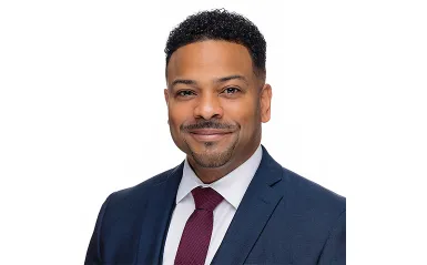 man in a nice suit smiling