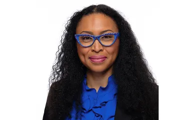 woman smiling wearing glasses