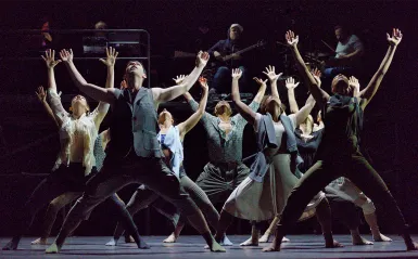 Dancers in a group on stage