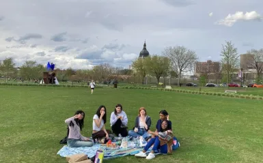 group photo sitting on the ground