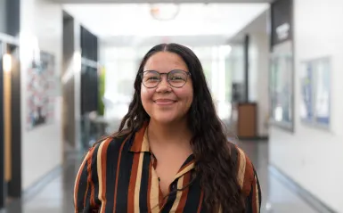 woman wearing glasses smiling