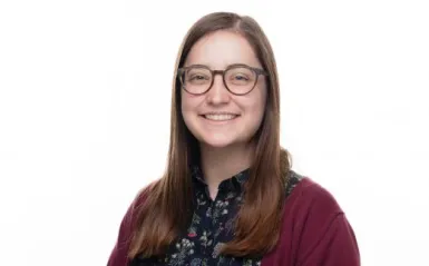 woman smiling with glasses 