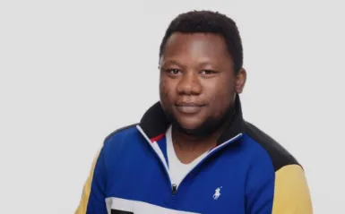 man smiling with a white background