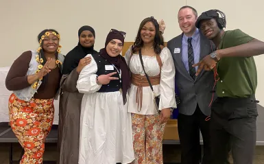 A group of Student Senate members posed for a photo with their advisor, Monte.
