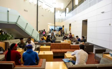 large group of student in indoor lounge area