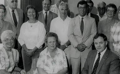 black and white photo of the founders of the North Hennepin Community College (NHCC) Foundation