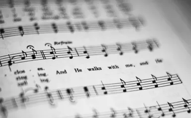 An image of sheet music with notes and words.