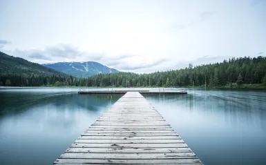 a photo of mountains and water symbolizing peace 