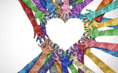 colorful hands connecting to form a heart shape