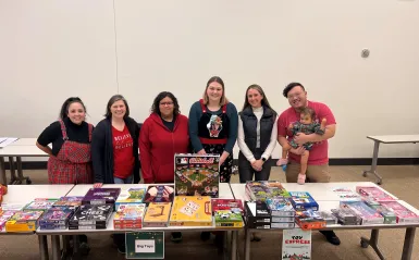 a photo of volunteers at the toy drive