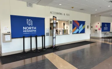 this is a photo taken in the Educational Services building at NHCC, looking from the hallway towards the Accounting and Fees office. 