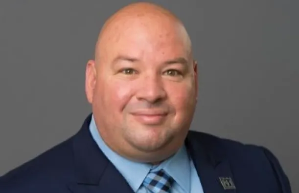 man in a nice suit smiling 