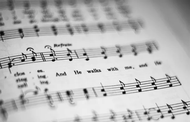 An image of sheet music with notes and words.