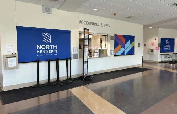 this is a photo taken in the Educational Services building at NHCC, looking from the hallway towards the Accounting and Fees office. 