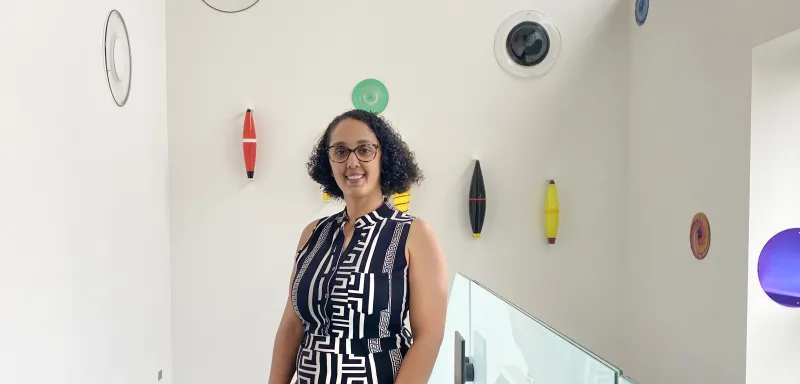 woman smiling wearing glasses