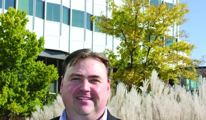 paralegal alumni Michael Larson standing outside smiling at the camera