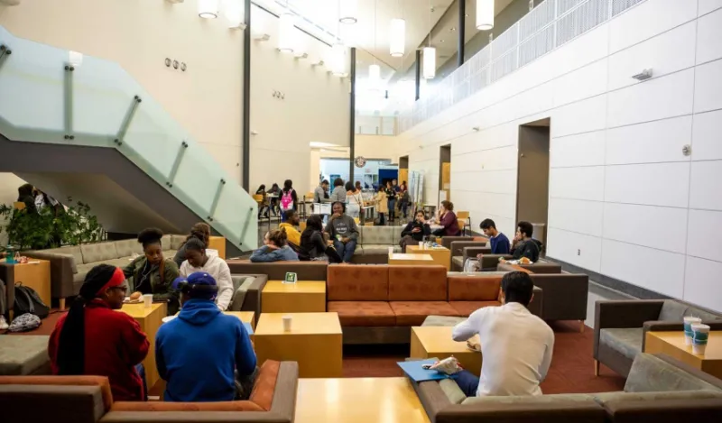 large group of student in indoor lounge area