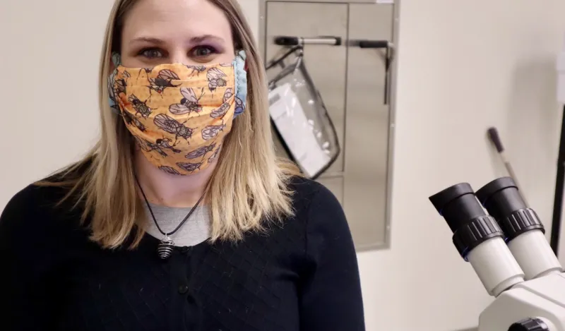 nursing student Melissa Sawyer standing and facing the camera inside an NHCC lab